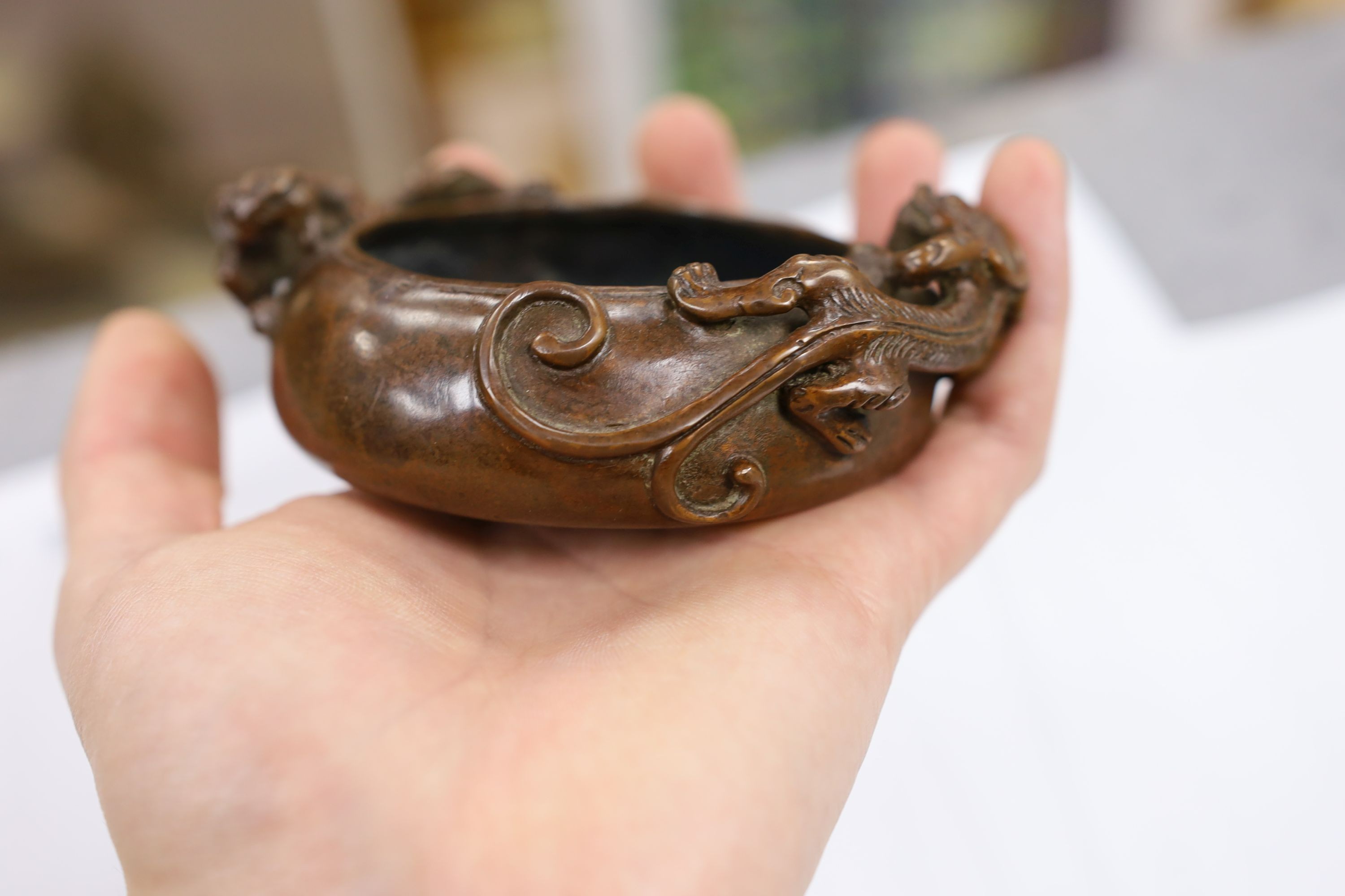 Two Chinese bronze censers, largest 11cms diameter